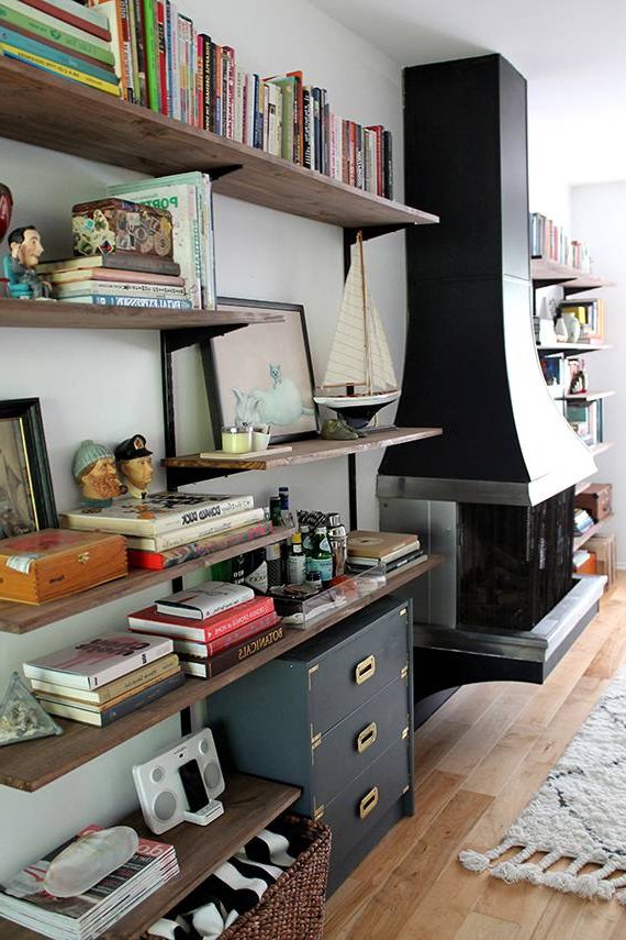 An empty white wall transformed with shelves