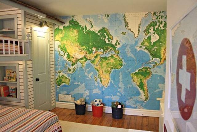 A world map mural decorating a children's room